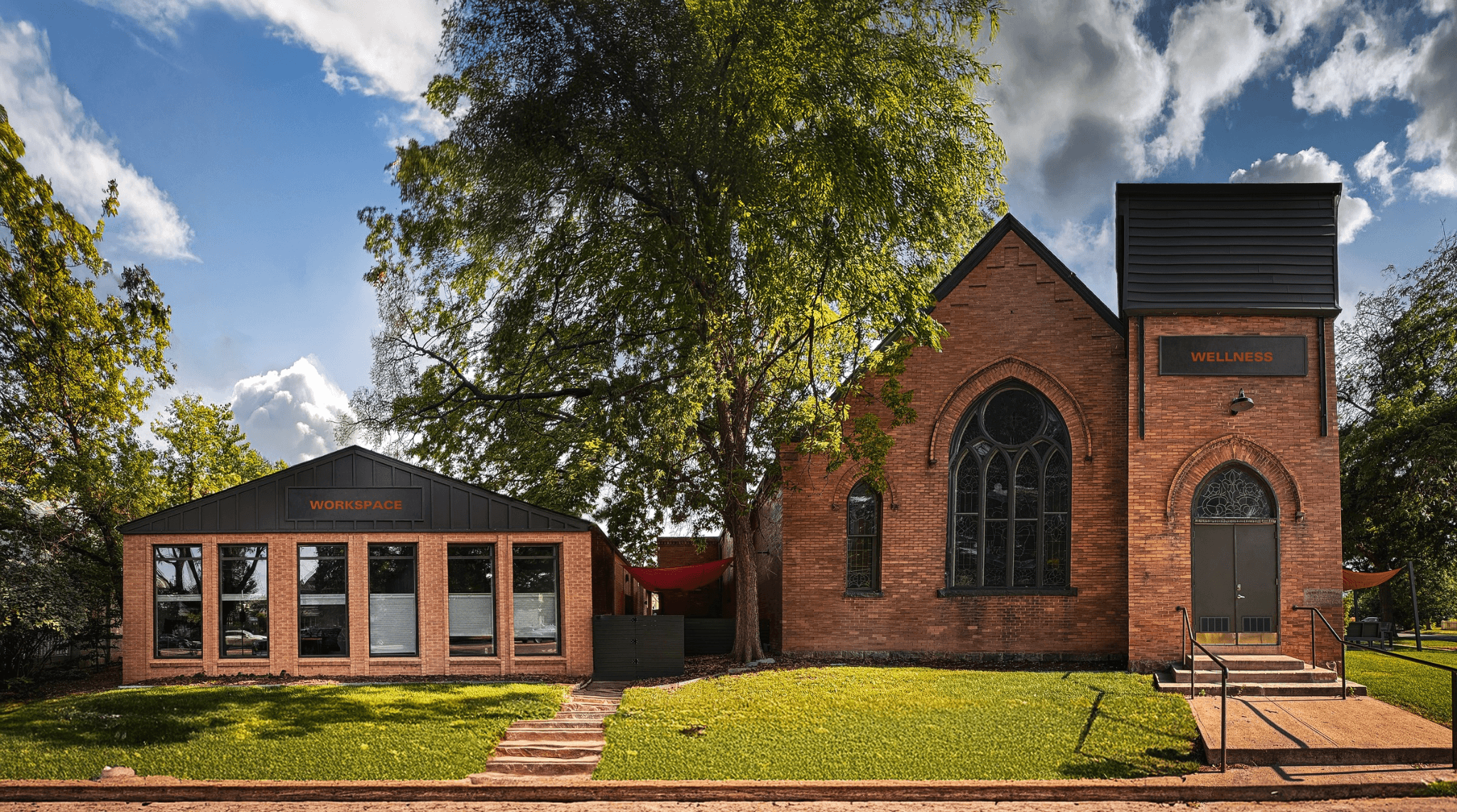 Historic Merritt Wellness yoga studio exterior in Denver Sloans Lake neighborhood - 1905 church building